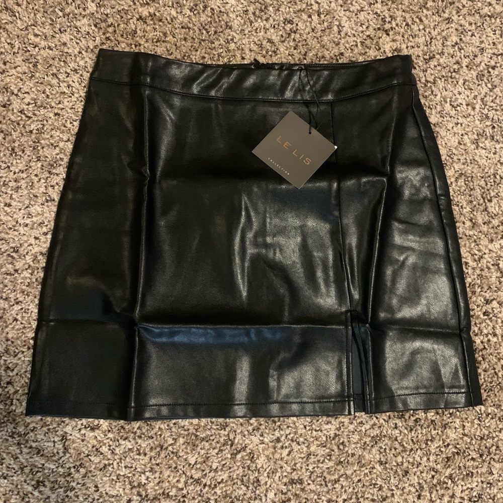 Boutique black leather skirt
